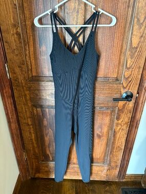 Zyia Active black Reve jumpsuit, ribbed, strappy, NWT size Medium